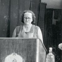Alma Ancelāne giving a presentation