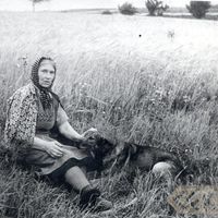 An unidentified woman with a dog